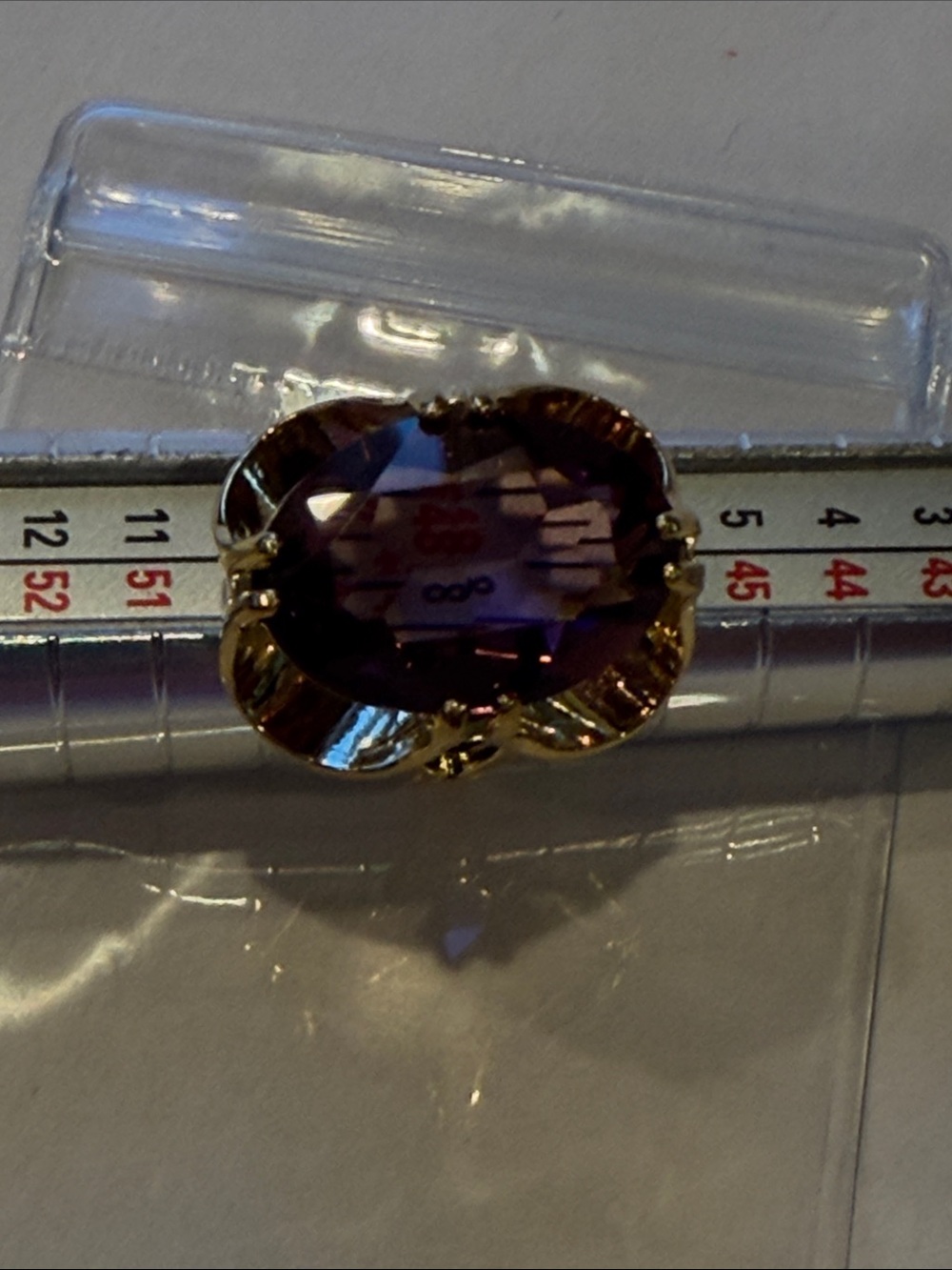 18KGE CZ size 5Gold-Tone Ring with Purple Gemstone